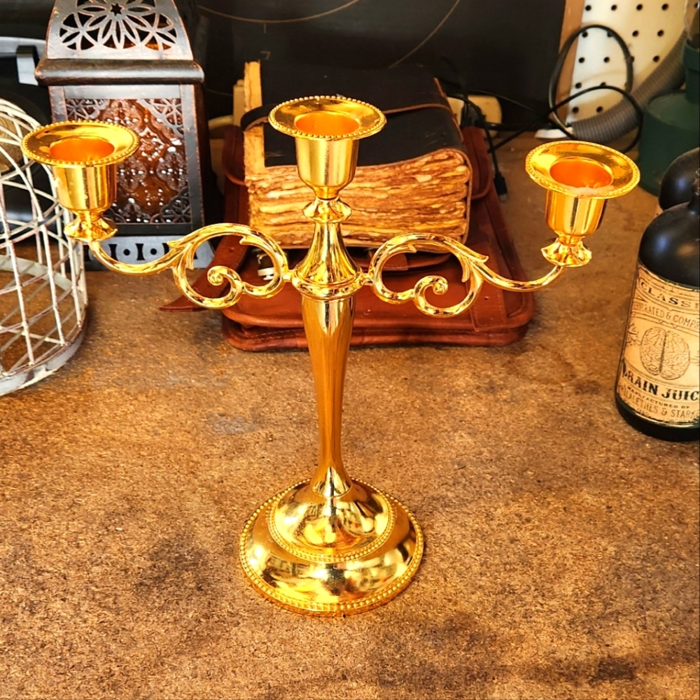 Gold candle stick holder